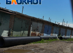 Жителям Днепрорудного закрыли доступ к гаражам из-за несостоявшегося ремонта канализации
