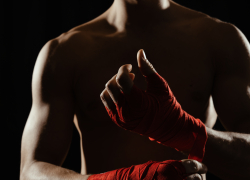 В Днепрорудном чемпионам по ММА запретили тренироваться и посещать спортзал