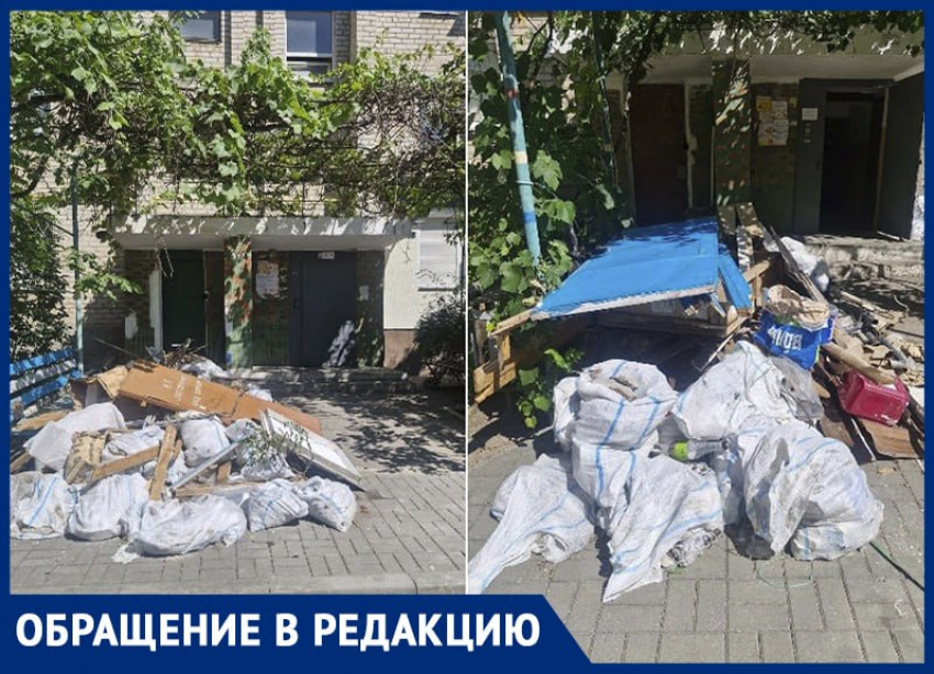 Коммунальщики отказались убирать кучи мусора у подъездов многоэтажки в Мелитополе